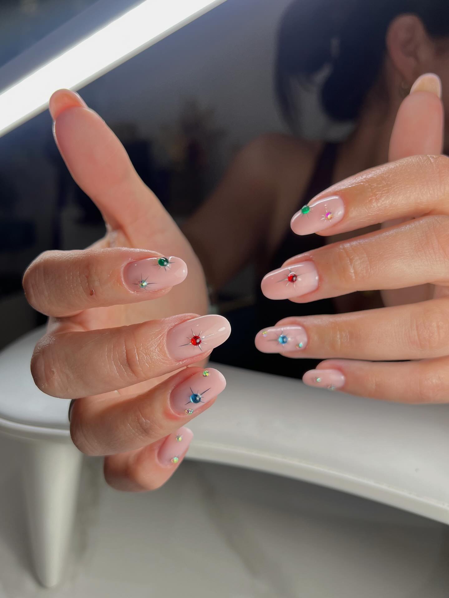 Bare nails with tiny coloured gem accents